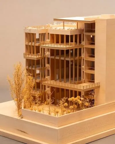 Maqueta de edificio en esquina con terrazas